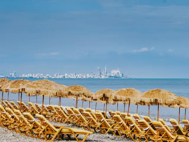 Pebble beach and promenade at Dreamland Oasis in Chakvi