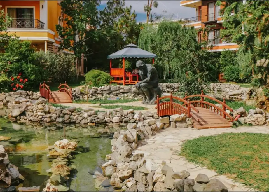 Fish pond and landscaped grounds at Dreamland Oasis